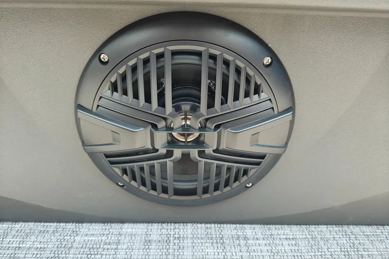 Slide: The Image of Close-up of a speaker on a 2026 Sun Tracker Party Barge 20 DLX. - 27