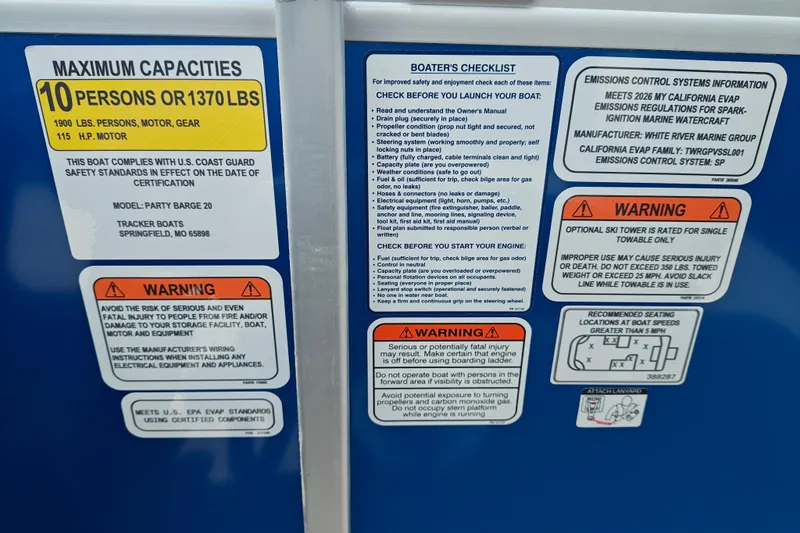 Slide: The Image of 2026 Sun Tracker Party Barge 20 DLX safety and capacity labels, including warnings and boater's checklist. - 18
