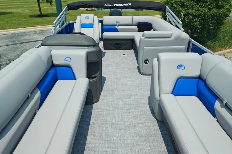 Slide: The Image of 2026 Sun Tracker Party Barge 20 DLX interior with spacious seating and modern design. - 5