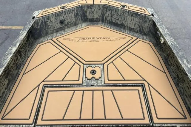 Slide: The Image of 2026 Tracker Grizzly 1650 T Prairie Wings Edition boat interior with custom design. - 16