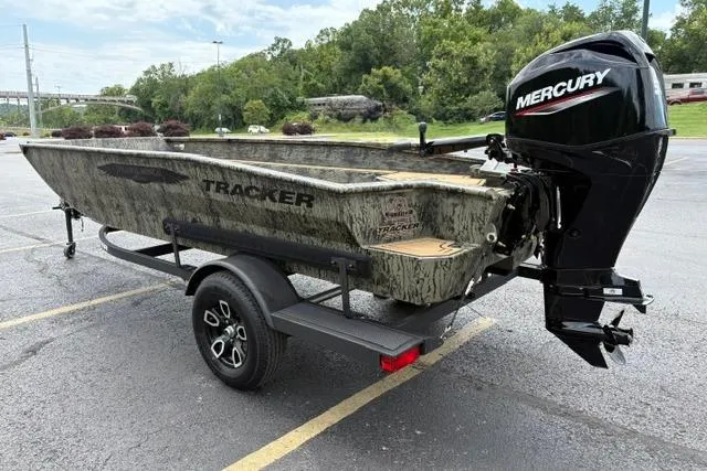 Slide: The Image of 2026 Tracker Grizzly 1650 T Prairie Wings Edition boat with Mercury engine on trailer. - 11