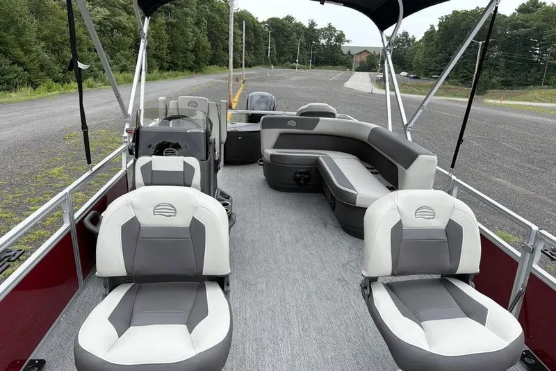 Slide: The Image of 2026 Sun Tracker Bass Buggy 18 DLX pontoon boat with spacious seating and modern design. - 6