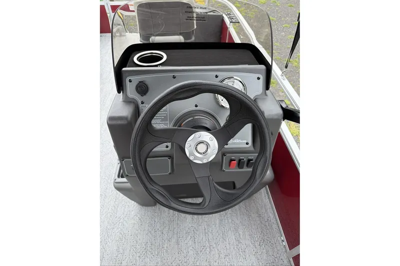 Slide: The Image of Steering console of 2026 Sun Tracker Bass Buggy 18 DLX pontoon boat. - 8