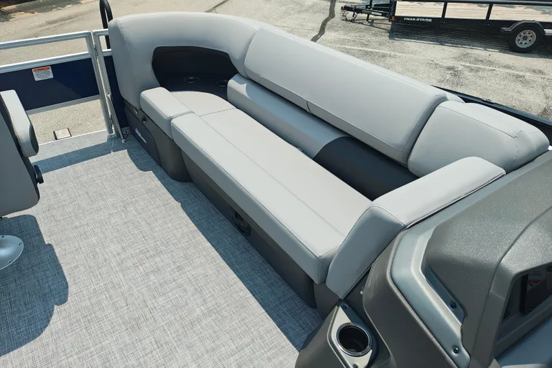 Slide: The Image of 2026 Sun Tracker SportFish 20 DLX boat interior with gray seating and modern design. - 27