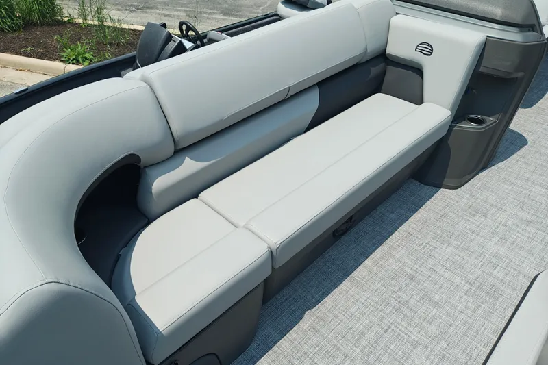 Slide: The Image of 2026 Sun Tracker SportFish 20 DLX boat interior with gray cushioned seating and modern design. - 8
