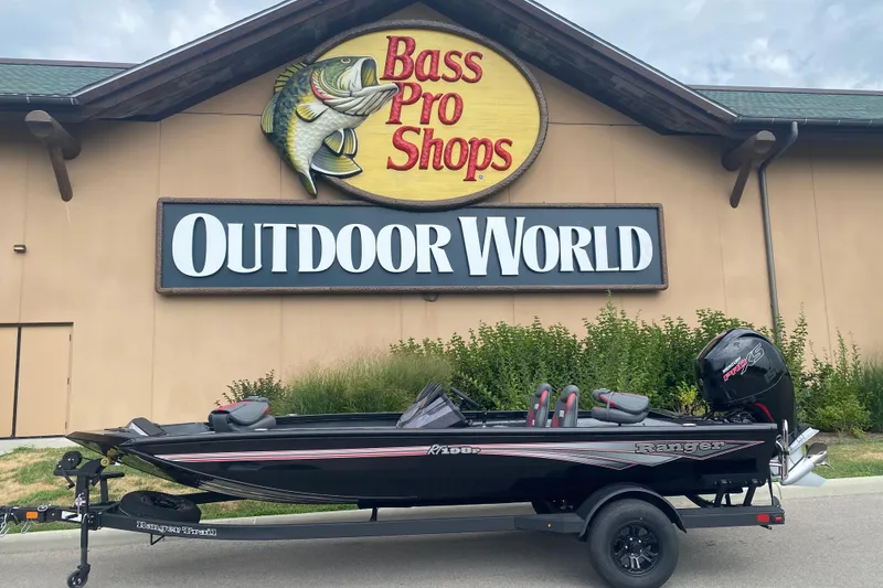 The Image of 2026 Ranger RT198P boat displayed outside Bass Pro Shops Outdoor World. - 0