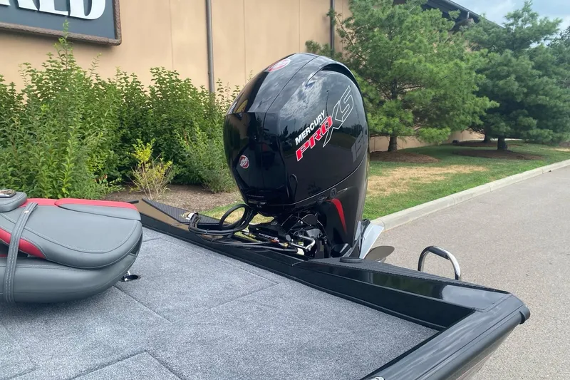 Slide: The Image of 2026 Ranger RT198P boat with Mercury Pro XS engine, parked outdoors. - 5