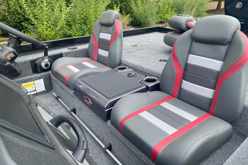 Slide: The Image of 2026 Ranger RT198P boat interior with gray and red seats, steering wheel, and console. - 6