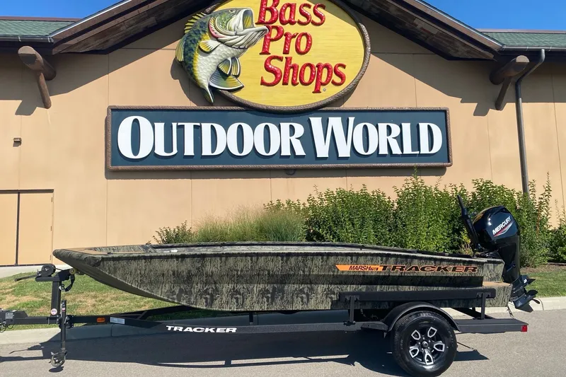 The Image of 2026 Tracker Grizzly 1756 T Marsh boat outside Bass Pro Shops Outdoor World. - 0