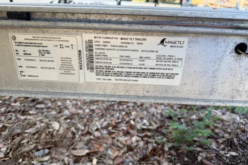 Slide: The Image of Label on Magic Tilt trailer for Sea Pro 248 Bay, 2021 model, showing specifications. - 42