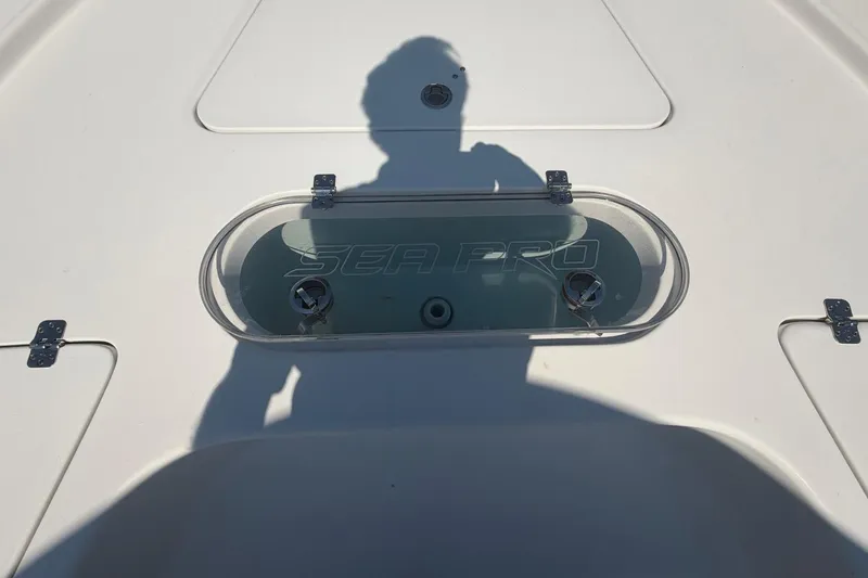 Slide: The Image of 2021 Sea Pro 248 Bay boat deck with shadow and logo visible. - 35