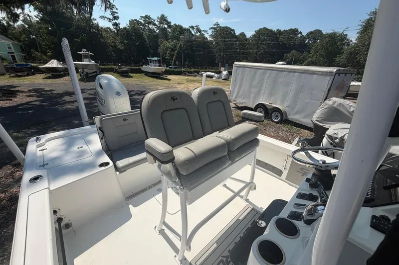 Slide: The Image of 2021 Sea Pro 248 Bay boat interior with seating and steering console. - 40
