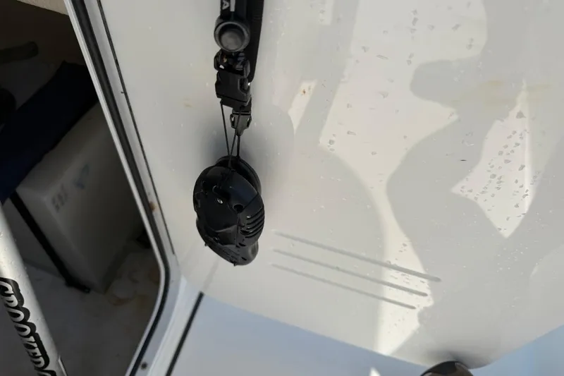Slide: The Image of 2021 Sea Pro 248 Bay boat interior with mounted black device. - 29