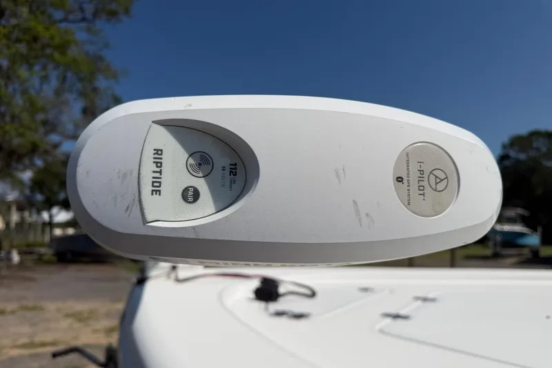 Slide: The Image of Close-up of a 2021 Sea Pro 248 Bay boat's Riptide i-Pilot trolling motor. - 15