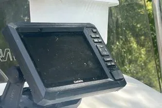 Slide: The Image of Garmin marine GPS device on 2014 Carolina Skiff JVX18CC boat dashboard. - 5