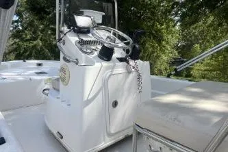Slide: The Image of 2014 Carolina Skiff JVX18CC boat interior with steering console and seating. - 6