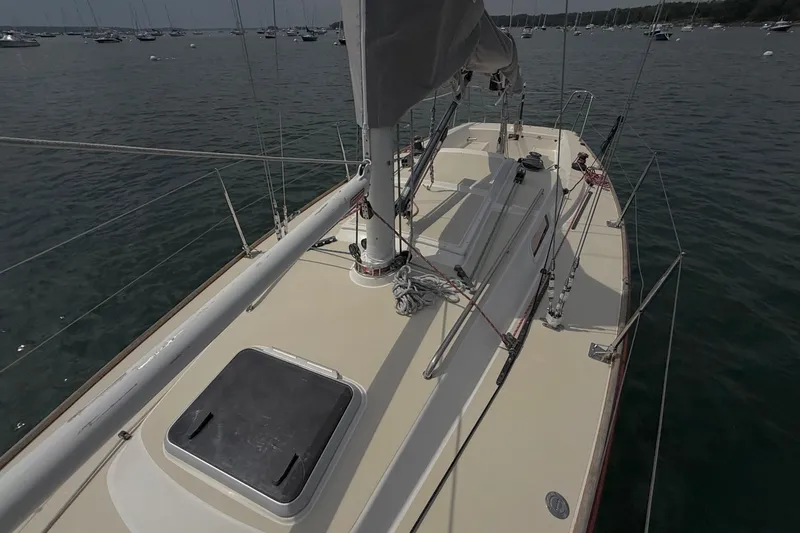 Slide: The Image of 2006 J Boats J/100 sailboat deck view on calm water. - 16