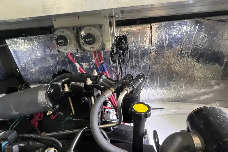 Slide: The Image of Engine room of 1998 Cruisers Yachts 3650 Aft Cabin with wiring and components. - 20