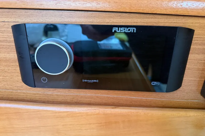 Slide: The Image of Fusion stereo system on a 2015 Catalina 445 yacht, featuring SiriusXM and WiFi capabilities. - 45