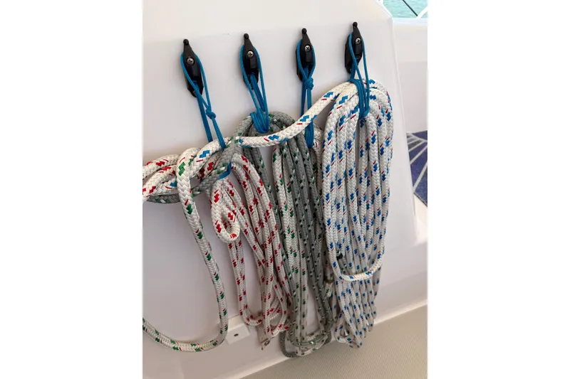 Slide: The Image of Colorful ropes neatly hung on a 2015 Catalina 445 sailboat. - 31