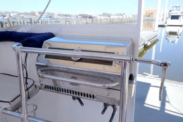 Slide: The Image of Outdoor grill on a 2015 Catalina 445 yacht, docked at a marina. - 22