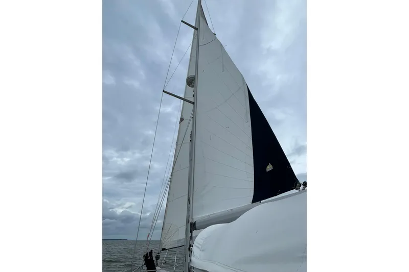 Slide: The Image of Sailing on a 2015 Catalina 445 yacht under cloudy skies. - 2