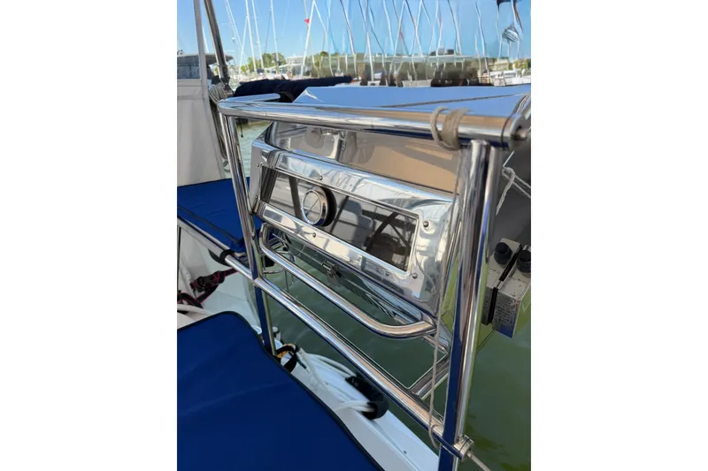 Slide: The Image of Cockpit view of a 2015 Catalina 445 sailboat with polished metal details. - 21