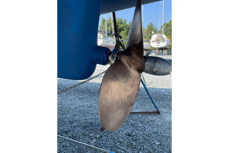 Slide: The Image of Propeller of a 2015 Catalina 445 sailboat on a gravel surface. - 32