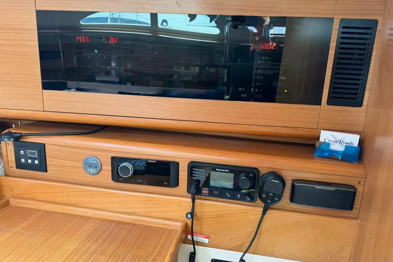 Slide: The Image of Control panel of a 2015 Catalina 445 yacht with navigation and communication equipment. - 41