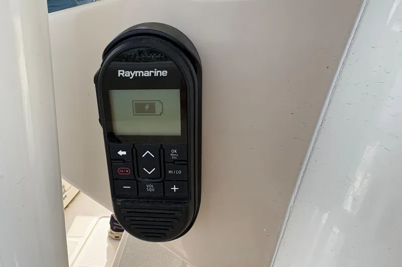Slide: The Image of Raymarine device on 2020 Boston Whaler 330 Outrage boat, displaying battery status. - 28