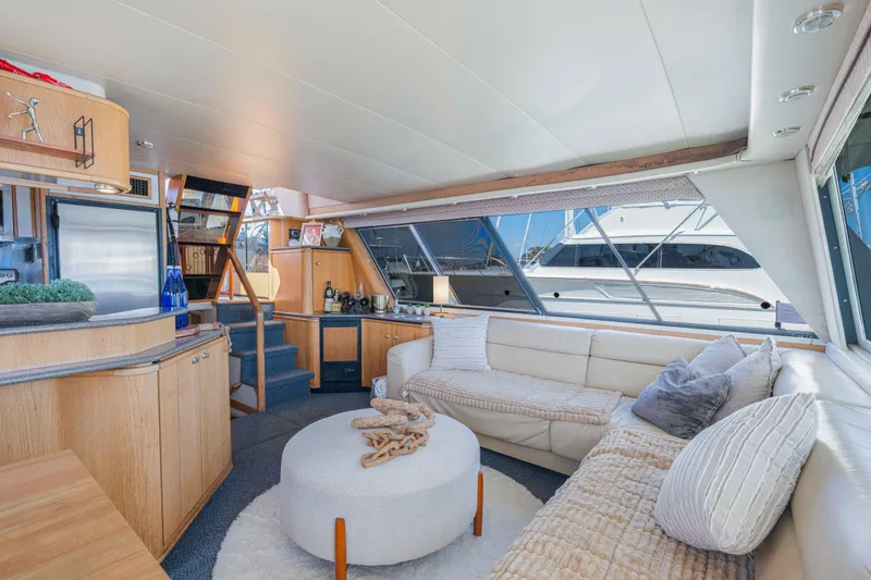 Slide: The Image of Luxurious interior of 1998 Bayliner 4788 Pilot House Motoryacht with plush seating and modern amenities. - 9