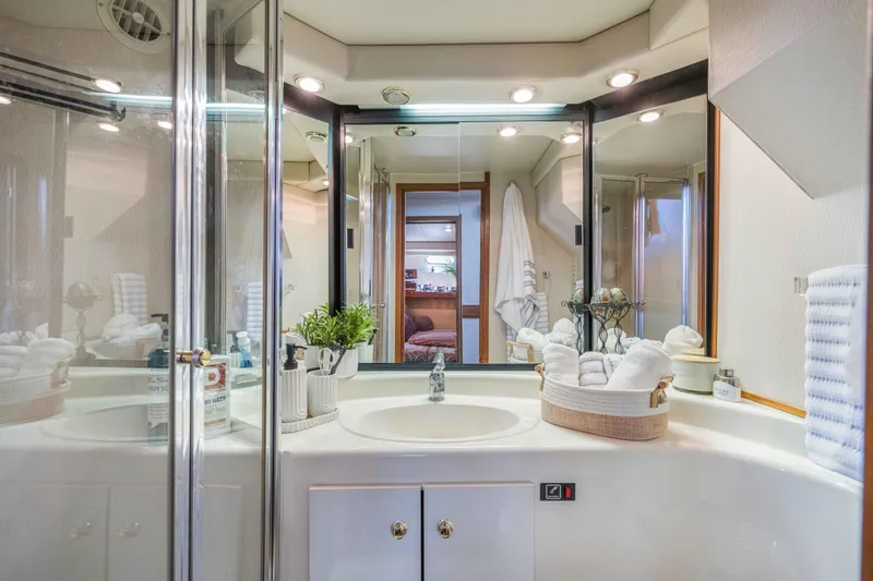 Slide: The Image of Luxurious bathroom in 1998 Bayliner 4788 Pilot House Motoryacht with modern amenities. - 15