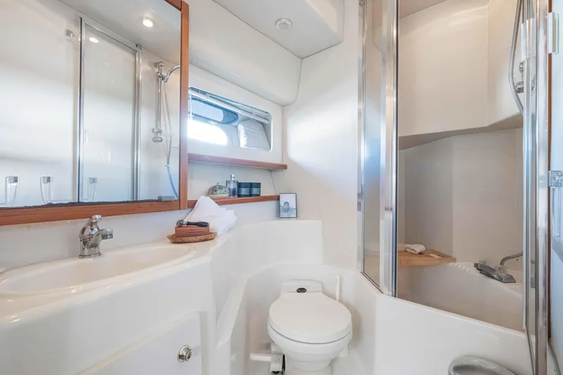 Slide: The Image of Luxurious bathroom in 1998 Bayliner 4788 Pilot House Motoryacht with shower and vanity. - 20
