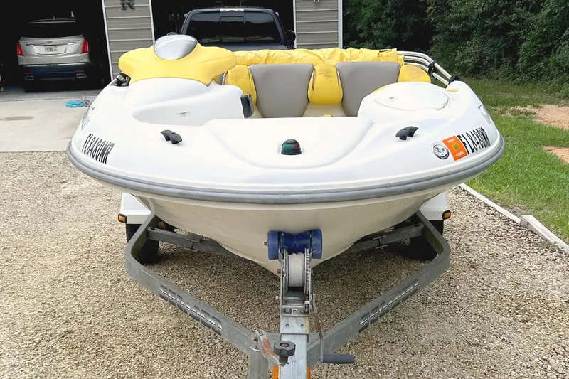 Slide: The Image of 2004 Sea-Doo Sportster LE DI boat on trailer, parked in driveway. - 3