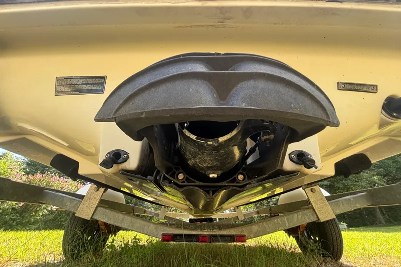 Slide: The Image of 2004 Sea-Doo Sportster LE DI boat underside on trailer, showcasing jet propulsion system. - 5