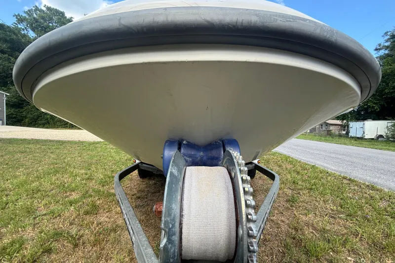 Slide: The Image of 2004 Sea-Doo Sportster LE DI boat on trailer, viewed from the front, outdoors. - 9
