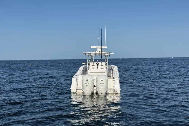 Slide: The Image of 2020 Southport 33 FE boat with twin engines on open sea. - 11