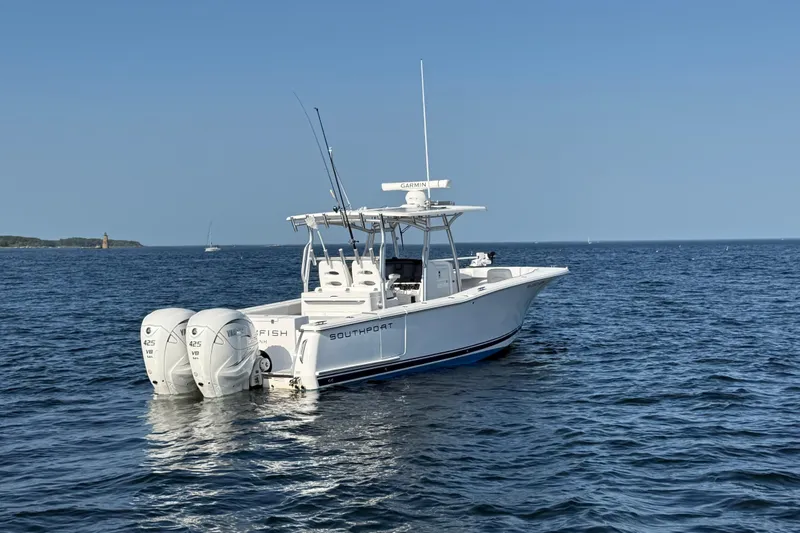 Slide: The Image of 2020 Southport 33 FE boat with twin engines on open water. - 9