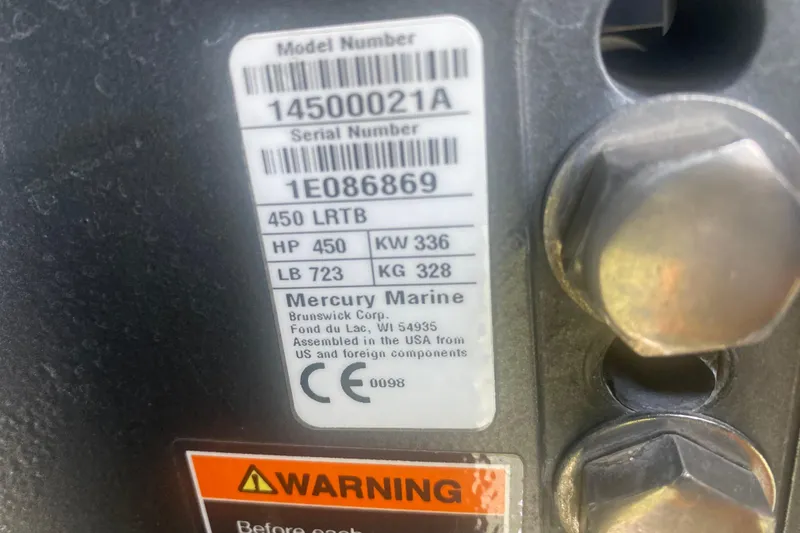 Slide: The Image of Label on Mercury Marine engine, model 450 LRTB, with warning and specifications. - 22