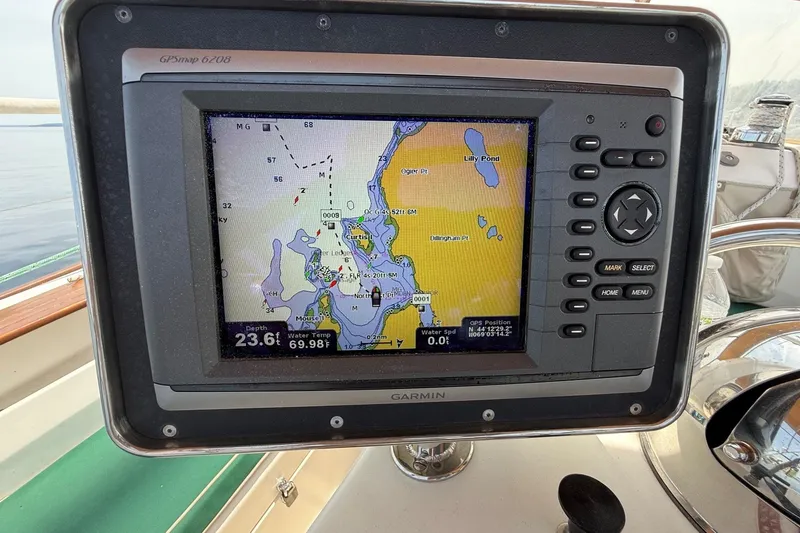 Slide: The Image of Garmin GPS navigation system on a 1993 Tartan 4600 sailboat displaying nautical chart. - 15