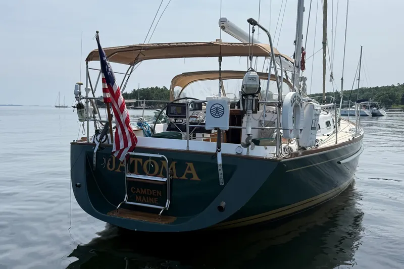 Slide: The Image of Sailboat Tartan 4600, 1993 model, docked in calm waters, Camden, Maine. - 2