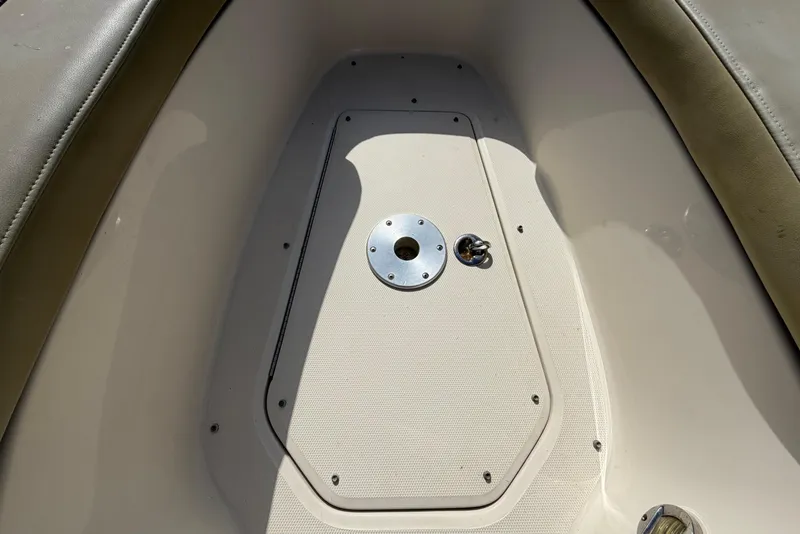 Slide: The Image of Close-up of the storage compartment on a 2005 Sea Ray 240 Sundeck boat. - 46