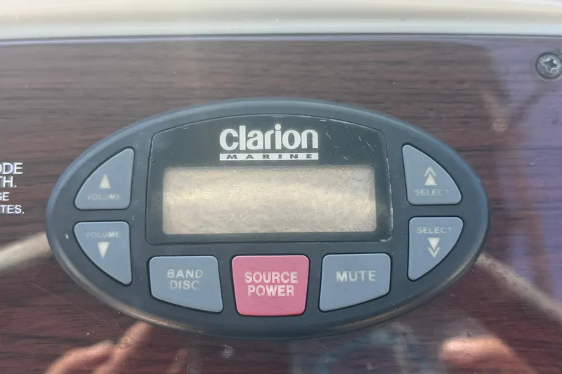 Slide: The Image of Clarion Marine audio system on 2005 Sea Ray 240 Sundeck boat dashboard. - 28