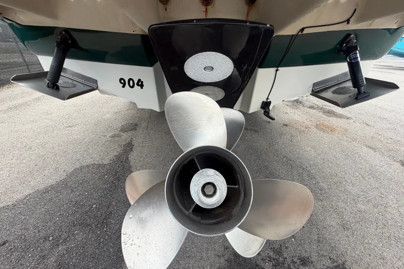 Slide: The Image of Rear view of 2005 Sea Ray 240 Sundeck boat propeller and hull. - 4