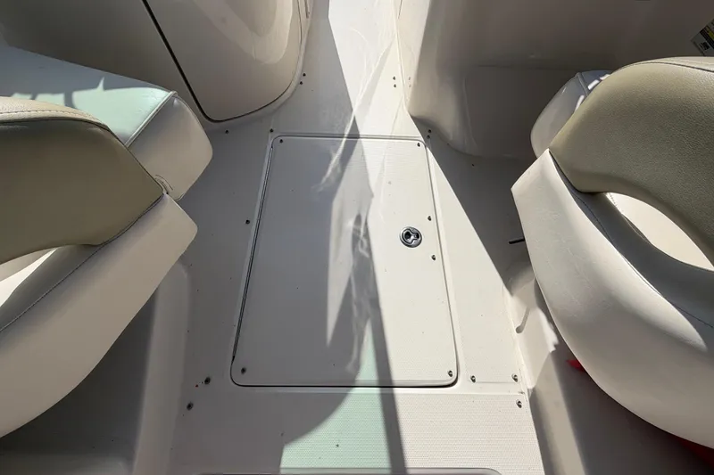 Slide: The Image of The image shows the floor of a 2005 Sea Ray 240 Sundeck boat with two seats. - 33