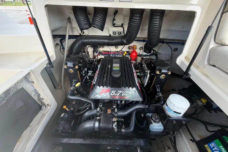 Slide: The Image of Engine compartment of a 2005 Sea Ray 240 Sundeck with 5.7L EFI engine. - 73