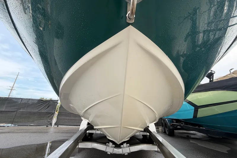 Slide: The Image of 2005 Sea Ray 240 Sundeck boat on trailer, viewed from the front. - 10