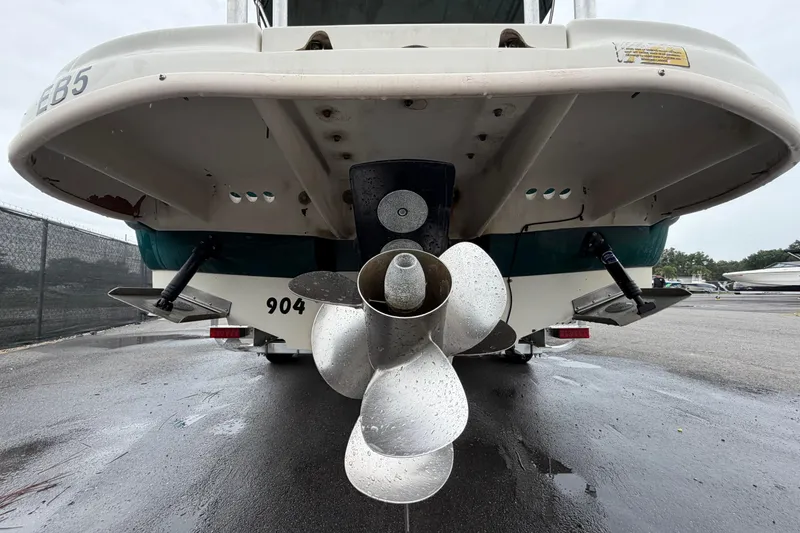 Slide: The Image of Rear view of a 2005 Sea Ray 240 Sundeck boat with visible propeller. - 4