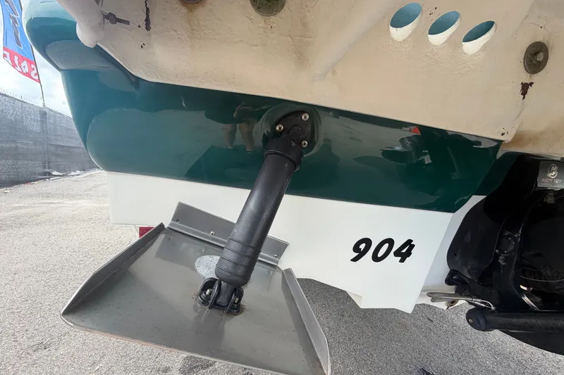 Slide: The Image of Rear view of 2005 Sea Ray 240 Sundeck boat with trim tab and hydraulic system. - 6