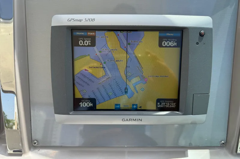 Slide: The Image of Garmin GPSmap 5208 on 2011 Chaparral 310 Signature boat, displaying navigation map. - 29